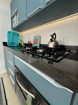 A cozinha ou kitchenette de María Augusta. Apto 304