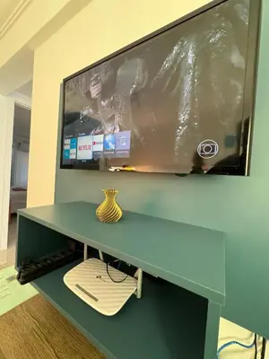Uma televisão e/ou sistema de entretenimento em María Augusta. Apto 304