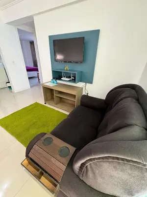 Uma televisão e/ou sistema de entretenimento em María Augusta. Apto 304