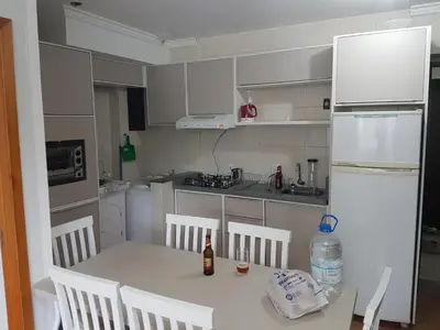 A cozinha ou kitchenette de Novo lar Camboriu Park Frente Mar