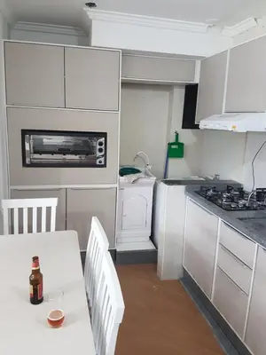 A cozinha ou kitchenette de Novo lar Camboriu Park Frente Mar