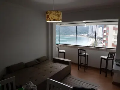 Uma área de estar em Novo lar Camboriu Park Frente Mar