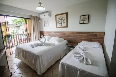 Uma cama ou camas num quarto em Pousada Al Mare