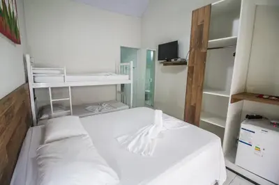 Uma cama ou camas num quarto em Pousada Al Mare