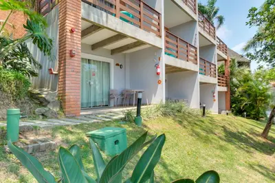 Um jardim no exterior de Pousada do Arvoredo