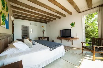 Uma televisão e/ou sistema de entretenimento em Resort Refúgio do Estaleiro