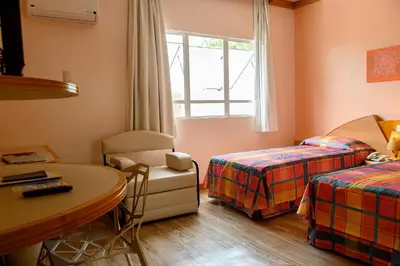 Uma cama ou camas num quarto em Solis Praia Hotel Itapema
