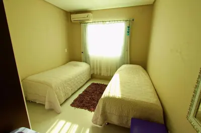 Uma cama ou camas num quarto em Villa das Ondas - Mariscal