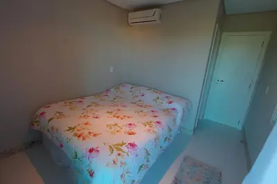 Uma cama ou camas num quarto em Villa das Ondas - Mariscal