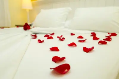 Uma cama ou camas num quarto em Pousada Vila do Bosque