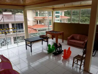 Uma área de estar em Maranata Hotel