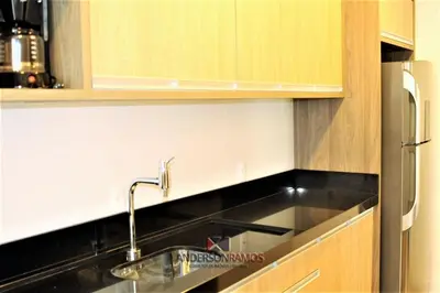 A cozinha ou kitchenette de 1042 - Apartamento no centro de Bombinhas - Residencial Águas Azuis Apto 203 B