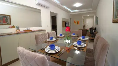 Uma área de estar em 1067 - Apartamento para locação em Bombinhas com 03 suítes
