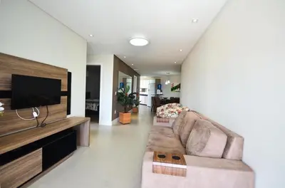 Uma televisão e/ou sistema de entretenimento em 1032 - Apartamento para locação no centro de Bombinhas - Residencial Boulervard - 210