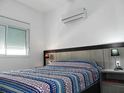 Uma cama ou camas num quarto em 1058 - Praia de Bombinhas locação de temporada
