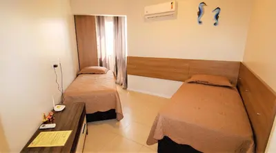 Uma cama ou camas num quarto em 1052 - Apartamento com vista para o mar em Bombinhas - Residencial Salema Apto 301