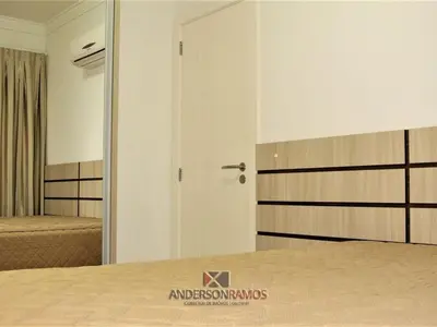 Uma cama ou camas num quarto em 1049 - Praia de Bombinhas locação de temporada - Residencial Egídio Pinheiro Apto 305 B