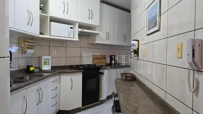 A cozinha ou kitchenette de Lindo Apto Itapema Meia Praia Frente ao Mar, 6 pessoas, alto padrão