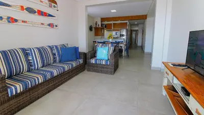 Uma televisão e/ou sistema de entretenimento em 1079 - Apartamento com vista para o mar em Bombinhas