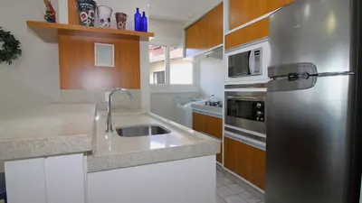 A cozinha ou kitchenette de 1079 - Apartamento com vista para o mar em Bombinhas