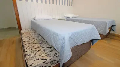 Uma cama ou camas num quarto em 1079 - Apartamento com vista para o mar em Bombinhas