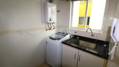 A cozinha ou kitchenette de 1006 - Apartamento com vista para o mar