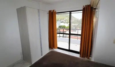 Uma cama ou camas num quarto em 1021 - Cobertura em Bombinhas com Vista para o Mar