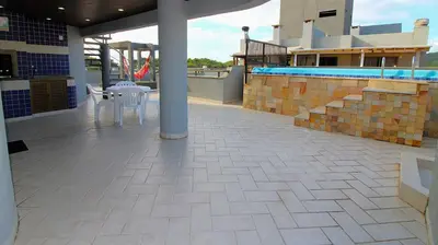 A piscina em ou perto de 1027 - Cobertura para locação em Bombinhas com piscina - Residencial Baia Azul Apto 503 A