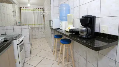 A cozinha ou kitchenette de 1029 - Apartamento no centro de Bombinhas - Residencial estrela do mar 2 104 A