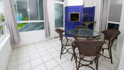 Uma televisão e/ou sistema de entretenimento em 1031 - Apartamento para locação em Bombinhas - Residencial Solar das Bromélias Apto 157