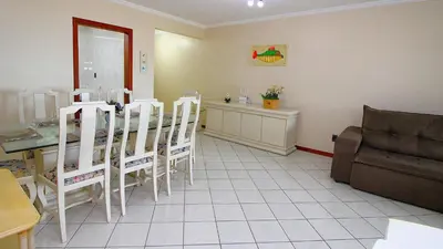 Uma área de estar em 1038 - Apartamento com vista para o mar Bombinhas