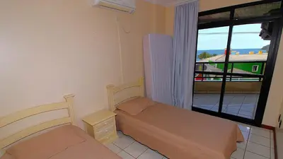 Uma área de estar em 1038 - Apartamento com vista para o mar Bombinhas
