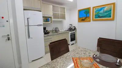 A cozinha ou kitchenette de 1040 - Apartamento para locação em Bombinhas - Residencial Egídio Pinheiro Apto 206 A