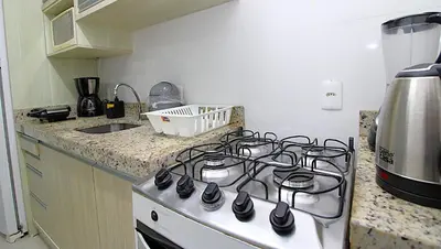 A cozinha ou kitchenette de 1040 - Apartamento para locação em Bombinhas - Residencial Egídio Pinheiro Apto 206 A