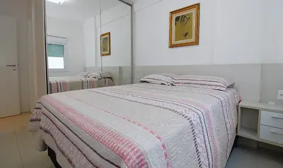 Uma cama ou camas num quarto em 1057 - Apartamento para locação em Bombinhas