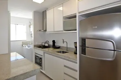 A cozinha ou kitchenette de 1081 - Praia de Bombinhas locação de temporada