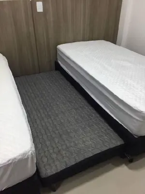 Uma cama ou camas num quarto em ALTO PADRÃO - LINDA VISTA MAR