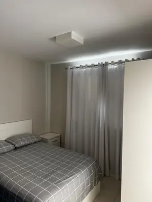Uma cama ou camas num quarto em Madrid