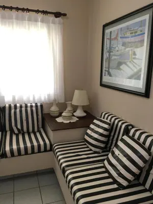 Uma área de estar em Excelente Casa em Bombas