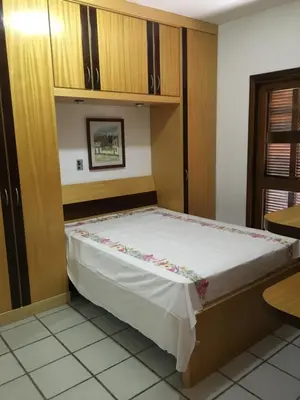 Uma cama ou camas num quarto em Excelente Casa em Bombas