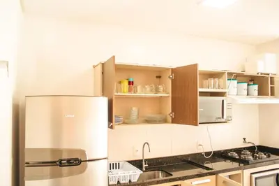 A cozinha ou kitchenette de temporadabombinhas 2 suítes