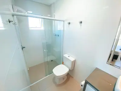Uma casa de banho em temporadabombinhas 2 suítes