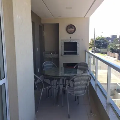 Uma televisão e/ou sistema de entretenimento em Edificio Villa Milano