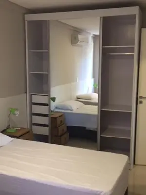 Uma cama ou camas num quarto em Edificio Villa Milano