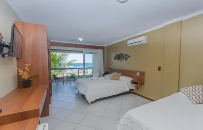 Uma cama ou camas num quarto em Pousada Garatéia