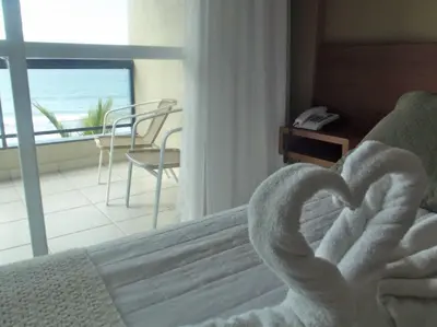 Uma cama ou camas num quarto em Pousada Garatéia