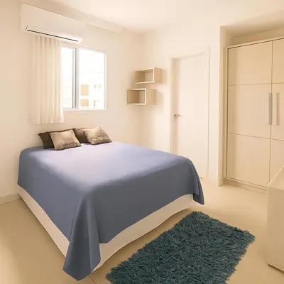 Uma cama ou camas num quarto em Meia Praia Apartamento Perfeito