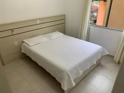 Uma cama ou camas num quarto em Res. Estoril