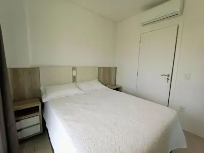 Uma cama ou camas num quarto em Residencial Natália