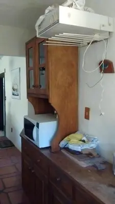 A planta de Apartamento Aconchegante